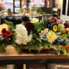A cheerful, country-market centerpiece that feels like a celebration of the season-this