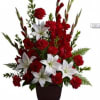 Heavenly white lilies, rich red carnations and gladioli create a touching funeral