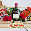 A playful, indulgent gift basket that pairs classic roses with celebratory treats-perfect