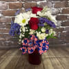 A beautiful red, white and blue arrangement perfect for any celebration.
Approx: 