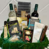 This gift basket includes 2 bottles of wine, gourmet snacks and the
