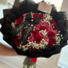 red and pink roses with baby breath