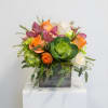 This arrangement is a 360 design, arranged in a wooden box. Subtle