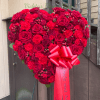 Solid heart of mixed red flowers- great to be display at the