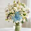 A serene and elegant vase arrangement featuring 3 stems of alstroemeria, 4