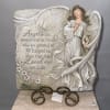 Angel memorial plaque with grieving quote and floral accents