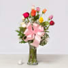 This rose arrangement that brings brilliant color to any of life's special