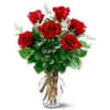 Bouquet of red roses in a clear glass vase