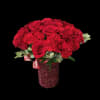Red roses and carnations in a glittery red vase