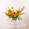 Inspired by the colors of a perfect summer sunset, this arrangement captures