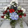 A display of red white and blue florals, perfect for the holidays.
