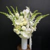 Tall, sculptural white blooms make a serene first impression in this flower