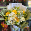 Mixed bloom bouquet with yellow and white flowers, roses, yellow gerbera daisies
