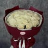 A lush cloud of cream-white roses makes an immediate, elegant impression-perfect as