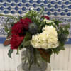 Hydrangea, roses, thistle and berries in shades of red, white and blue