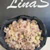 Large bouquet of pale pink and cream roses with small pink filler flowers