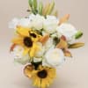 Bright, uplifting and thoughtfully balanced, this flower arrangement-the perfect "Just Because" or