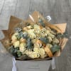 A delicate bouquet of fresh chamomile blooms, radiating natural beauty, warmth, and