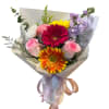 Sunlit gerbera daisies steal the show in this Day dream flower arrangement