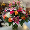 This gorgeous, lavish and bright arrangement is quite the showstopper with its