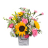 This cheerful flower arrangement, designed as a Mother's Day-ready gift , also