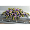 Lavender Fields of Peace is a full couch casket spray with a