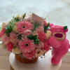 mixed flowers with teddy bear