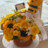 mixed yellow flowers with bee
