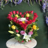 A bold heart of densely packed roses-this heart-shaped flower arrangement is a