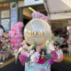 Mixed floral arrangement with a customizable balloon.