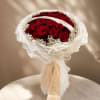 An elevated version of our classic red rose bouquet featuring luxurious layered