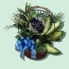 Lush variegated foliage and calming green houseplants arranged in a woven basket
