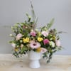 New spring arrangement of soft pink, greens, and yellow. A lovely addition