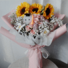 For the graduate who deserves the world.  
This joyful bouquet features