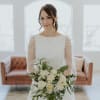 Classy white rose bouquet with baby's breath