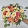 Beautiful brides bouquet approximately 15 inches wide by 7 inches tall 
