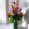 Tall, upright tropical bouquet designed to make someone feel celebrated-perfect as a