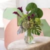 Bright, tropical celebration bouquet designed to make the person you're thinking of