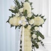 A large white standing cross designed for sympathy and memorial services, this