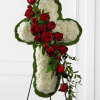 A striking cross-shaped standing spray arranged on a floral easel, this sympathy