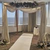 florals and greens woven around said structure