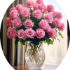 A lavish cascade of pink and red roses makes a bold romantic