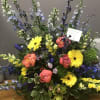 Basket arrangement of wildflowers