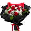 12 red roses with white blooms and baby&rsquo;s breath, elegantly wrapped in