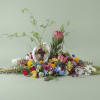 Originally designed in loving memory of a dear friend, these artistic floral