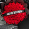 A bold hand-held birthday bouquet that reads as both romantic and celebratory: