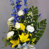 A lovely assortment of blues, yellows and white. Towering blues cascade into
