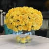 An impressive arrangement of yellow garden roses to brighten any day!