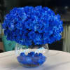 A breathtaking statement of monochromatic blue roses.