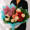 Graceful, sophisticated, and undeniably luxurious, Orchid Oasis bouquet is designed to make